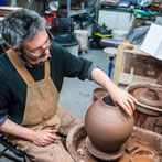 Doug Fitch and Hannah McAndrew making a jug for me